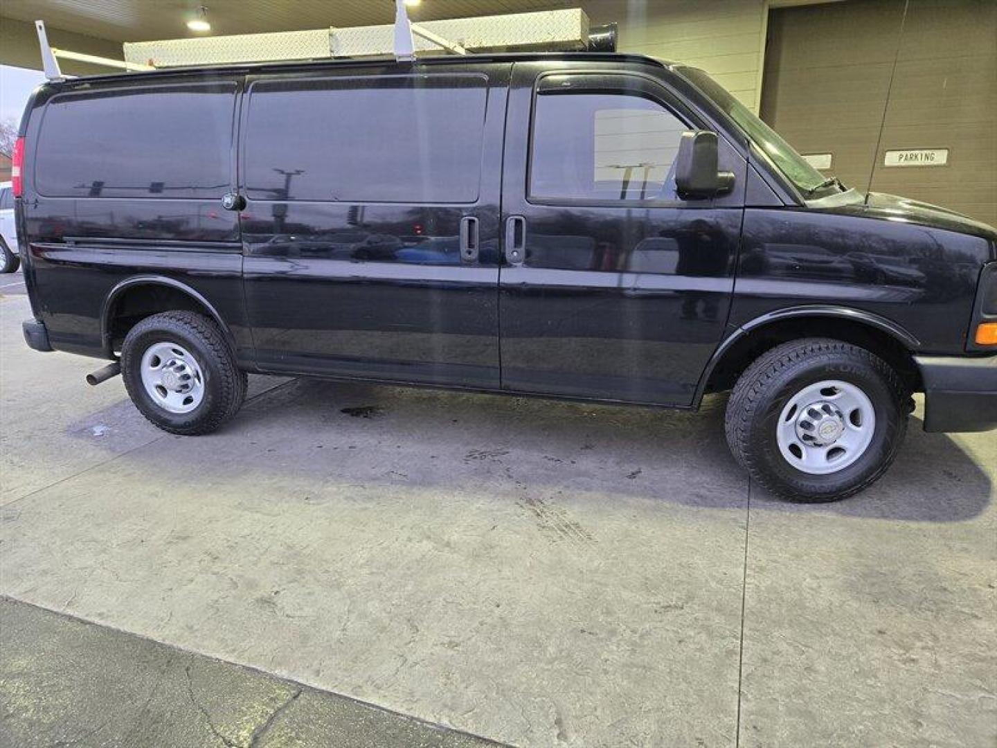 2012 Black Chevrolet Express Work Van Cargo (1GCZGTCA0C1) with an 4.8L Flex Fuel V8 280hp 295ft. lbs. engine, Automatic transmission, located at 25355 Eames Street, Channahon, IL, 60410, (815) 467-1807, 41.429108, -88.228432 - Looking for a powerful, reliable, and versatile vehicle that can handle anything you throw at it? Look no further than the 2012 Chevrolet Express 3500! With its 4.8L Flex Fuel V8 engine, producing a whopping 280 horsepower and 295 foot-pounds of torque, this van is a true workhorse. But that's not - Photo#1