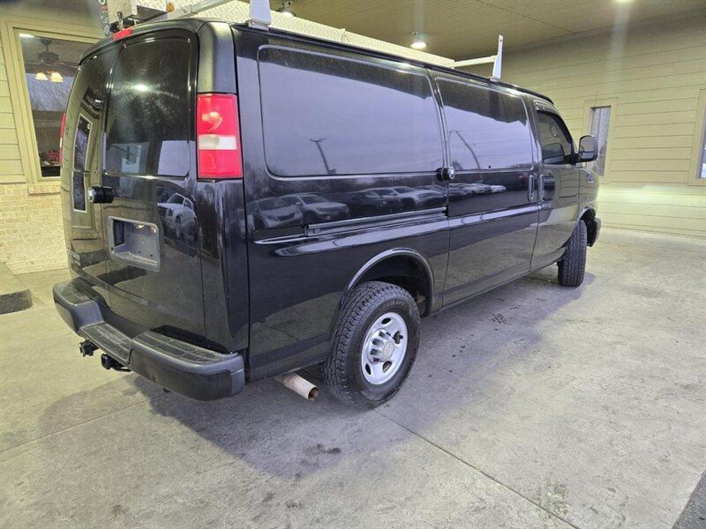 2012 Black Chevrolet Express Work Van Cargo (1GCZGTCA0C1) with an 4.8L Flex Fuel V8 280hp 295ft. lbs. engine, Automatic transmission, located at 25355 Eames Street, Channahon, IL, 60410, (815) 467-1807, 41.429108, -88.228432 - Looking for a powerful, reliable, and versatile vehicle that can handle anything you throw at it? Look no further than the 2012 Chevrolet Express 3500! With its 4.8L Flex Fuel V8 engine, producing a whopping 280 horsepower and 295 foot-pounds of torque, this van is a true workhorse. But that's not - Photo#2