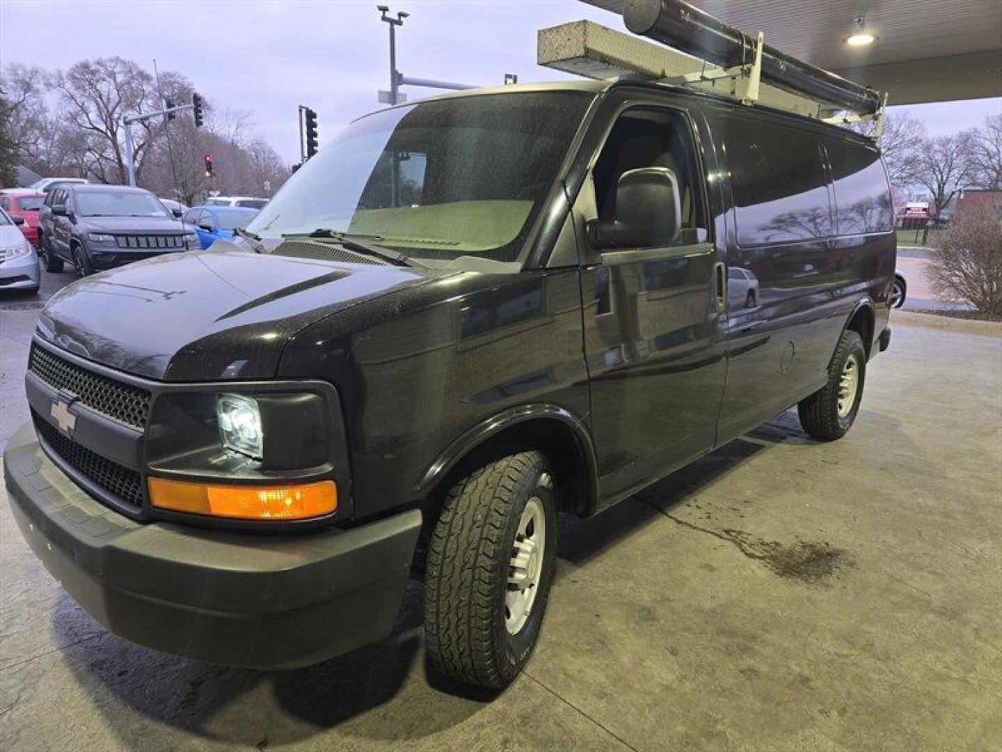 2012 Black Chevrolet Express Work Van Cargo (1GCZGTCA0C1) with an 4.8L Flex Fuel V8 280hp 295ft. lbs. engine, Automatic transmission, located at 25355 Eames Street, Channahon, IL, 60410, (815) 467-1807, 41.429108, -88.228432 - Looking for a powerful, reliable, and versatile vehicle that can handle anything you throw at it? Look no further than the 2012 Chevrolet Express 3500! With its 4.8L Flex Fuel V8 engine, producing a whopping 280 horsepower and 295 foot-pounds of torque, this van is a true workhorse. But that's not - Photo#6