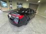 2022 Crystal Black Pearl Honda Civic Sport (2HGFE2F50NH) with an 2.0L I4 158hp 138ft. lbs. engine, Automatic transmission, located at 25355 Eames Street, Channahon, IL, 60410, (815) 467-1807, 41.429108, -88.228432 - Introducing the sleek and stylish 2022 Honda Civic Sport! This stunning sedan is ready to hit the road with its powerful 2.0L I4 engine, which delivers a smooth and efficient ride with 158 horsepower and 138ft. lbs. of torque. But the Civic Sport is more than just a powerful ride. It comes loaded - Photo#2