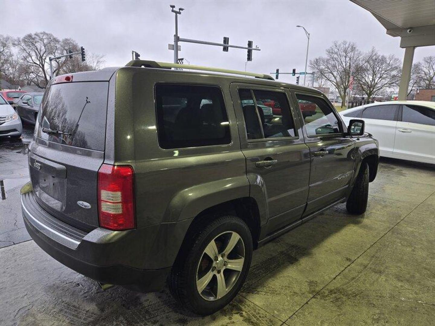 2016 Granite Crystal Metallic Clear Coat Jeep Patriot High Altitude (1C4NJPFA6GD) with an 2.0L I4 158hp 141ft. lbs. engine, Automatic transmission, located at 25355 Eames Street, Channahon, IL, 60410, (815) 467-1807, 41.429108, -88.228432 - Introducing the 2016 Jeep Patriot High Altitude - the perfect ride for those who demand the best of both worlds! Powered by a robust 2.0L I4 engine that pumps out an impressive 158hp and 141ft. lbs. of torque, this SUV is built to conquer even the toughest terrain. As for the factory default featur - Photo#2