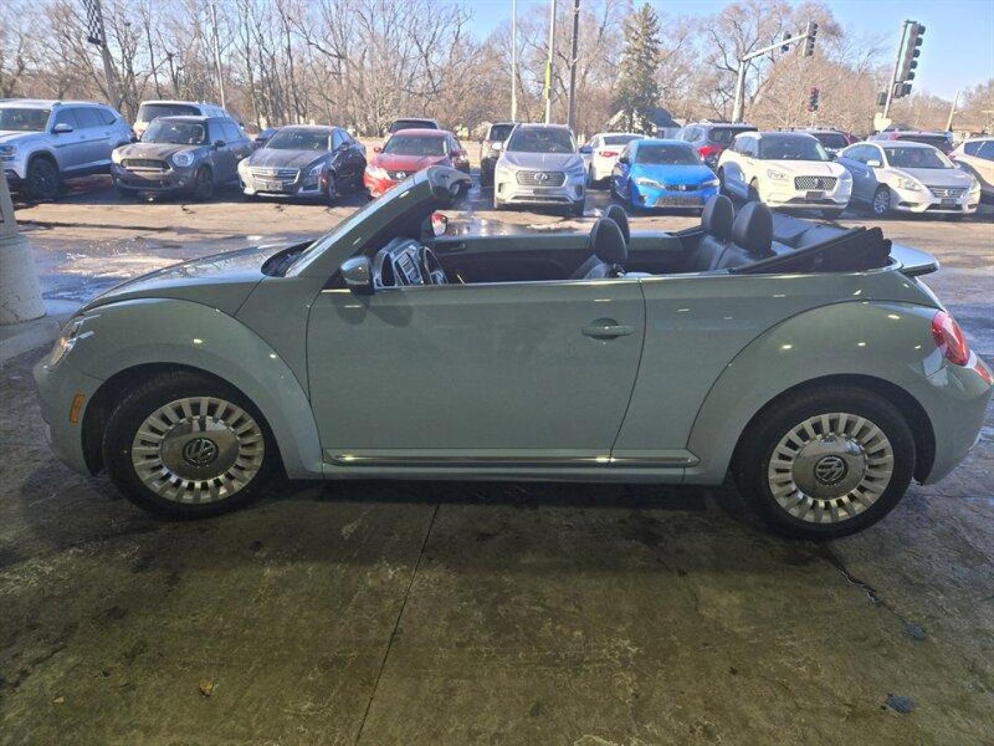 2015 Denim Blue Volkswagen Beetle Convertible 1.8T (3VW517AT5FM) with an 1.8L Turbo I4 170hp 184ft. lbs. PZEV engine, TipTronic transmission, located at 25355 Eames Street, Channahon, IL, 60410, (815) 467-1807, 41.429108, -88.228432 - Looking for a thrilling ride that combines style, performance, and efficiency? Look no further than the 2015 Volkswagen Beetle Convertible 1.8T PZEV! This powerhouse is equipped with a 1.8L Turbo I4 engine that delivers a jaw-dropping 170 horsepower and 184 foot-pounds of torque, giving you the powe - Photo#7