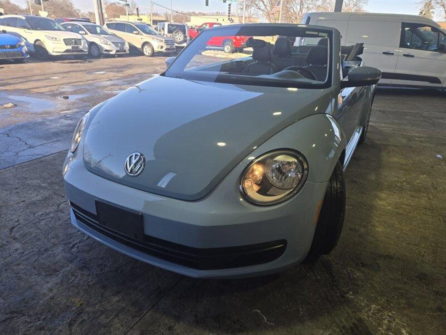 2015 Denim Blue Volkswagen Beetle Convertible 1.8T (3VW517AT5FM) with an 1.8L Turbo I4 170hp 184ft. lbs. PZEV engine, TipTronic transmission, located at 25355 Eames Street, Channahon, IL, 60410, (815) 467-1807, 41.429108, -88.228432 - Looking for a thrilling ride that combines style, performance, and efficiency? Look no further than the 2015 Volkswagen Beetle Convertible 1.8T PZEV! This powerhouse is equipped with a 1.8L Turbo I4 engine that delivers a jaw-dropping 170 horsepower and 184 foot-pounds of torque, giving you the powe - Photo#9