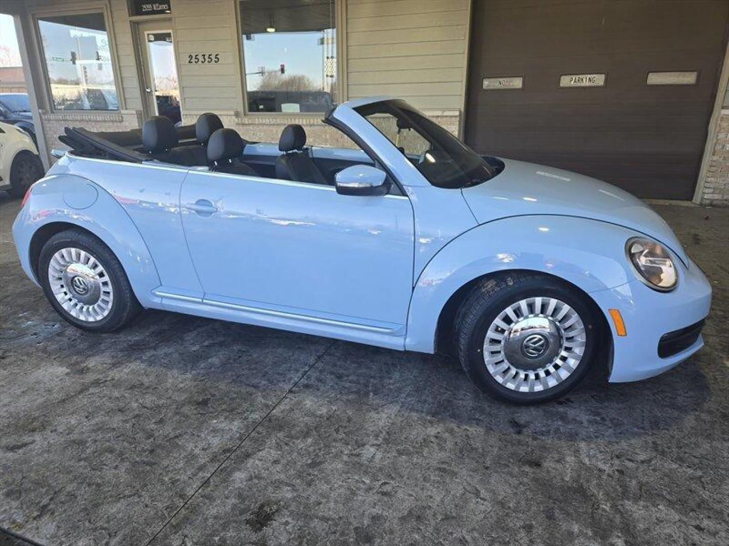 2015 Denim Blue Volkswagen Beetle Convertible 1.8T (3VW517AT5FM) with an 1.8L Turbo I4 170hp 184ft. lbs. PZEV engine, TipTronic transmission, located at 25355 Eames Street, Channahon, IL, 60410, (815) 467-1807, 41.429108, -88.228432 - Looking for a thrilling ride that combines style, performance, and efficiency? Look no further than the 2015 Volkswagen Beetle Convertible 1.8T PZEV! This powerhouse is equipped with a 1.8L Turbo I4 engine that delivers a jaw-dropping 170 horsepower and 184 foot-pounds of torque, giving you the powe - Photo#1