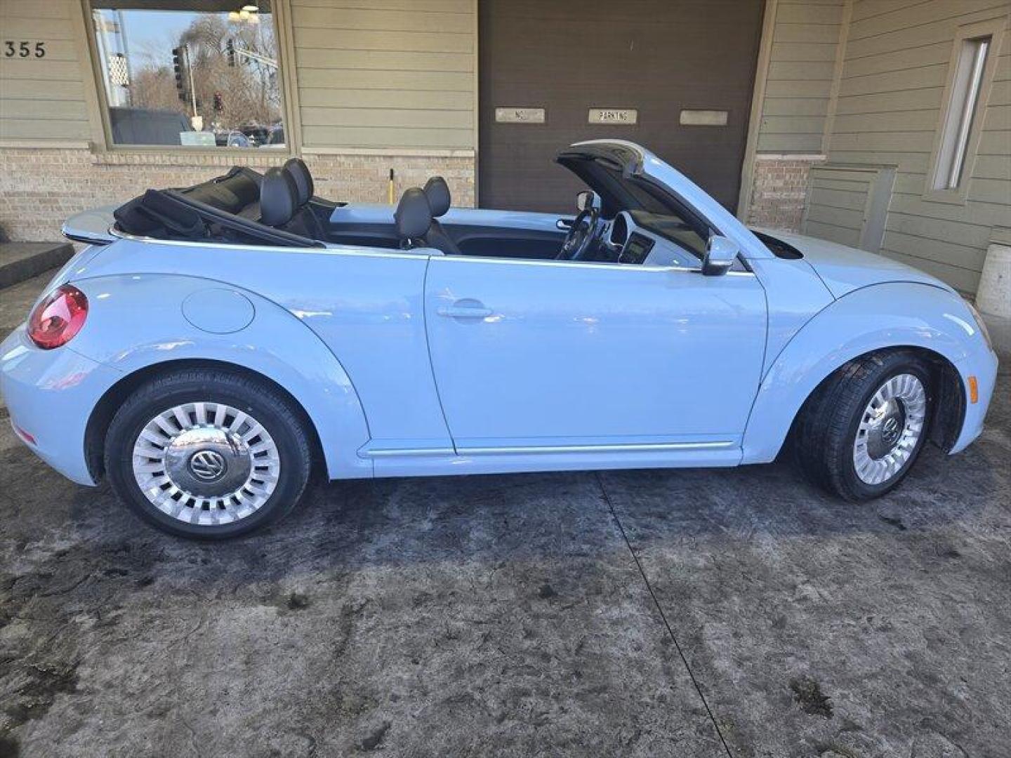 2015 Denim Blue Volkswagen Beetle Convertible 1.8T (3VW517AT5FM) with an 1.8L Turbo I4 170hp 184ft. lbs. PZEV engine, TipTronic transmission, located at 25355 Eames Street, Channahon, IL, 60410, (815) 467-1807, 41.429108, -88.228432 - Looking for a thrilling ride that combines style, performance, and efficiency? Look no further than the 2015 Volkswagen Beetle Convertible 1.8T PZEV! This powerhouse is equipped with a 1.8L Turbo I4 engine that delivers a jaw-dropping 170 horsepower and 184 foot-pounds of torque, giving you the powe - Photo#2