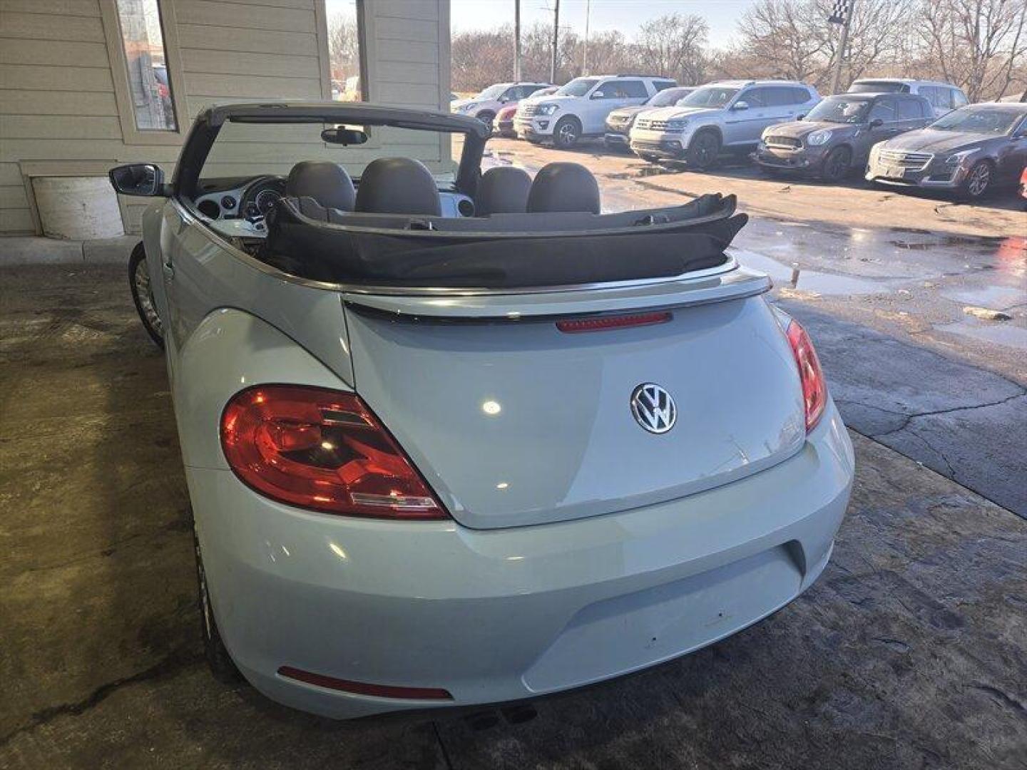 2015 Denim Blue Volkswagen Beetle Convertible 1.8T (3VW517AT5FM) with an 1.8L Turbo I4 170hp 184ft. lbs. PZEV engine, TipTronic transmission, located at 25355 Eames Street, Channahon, IL, 60410, (815) 467-1807, 41.429108, -88.228432 - Looking for a thrilling ride that combines style, performance, and efficiency? Look no further than the 2015 Volkswagen Beetle Convertible 1.8T PZEV! This powerhouse is equipped with a 1.8L Turbo I4 engine that delivers a jaw-dropping 170 horsepower and 184 foot-pounds of torque, giving you the powe - Photo#5