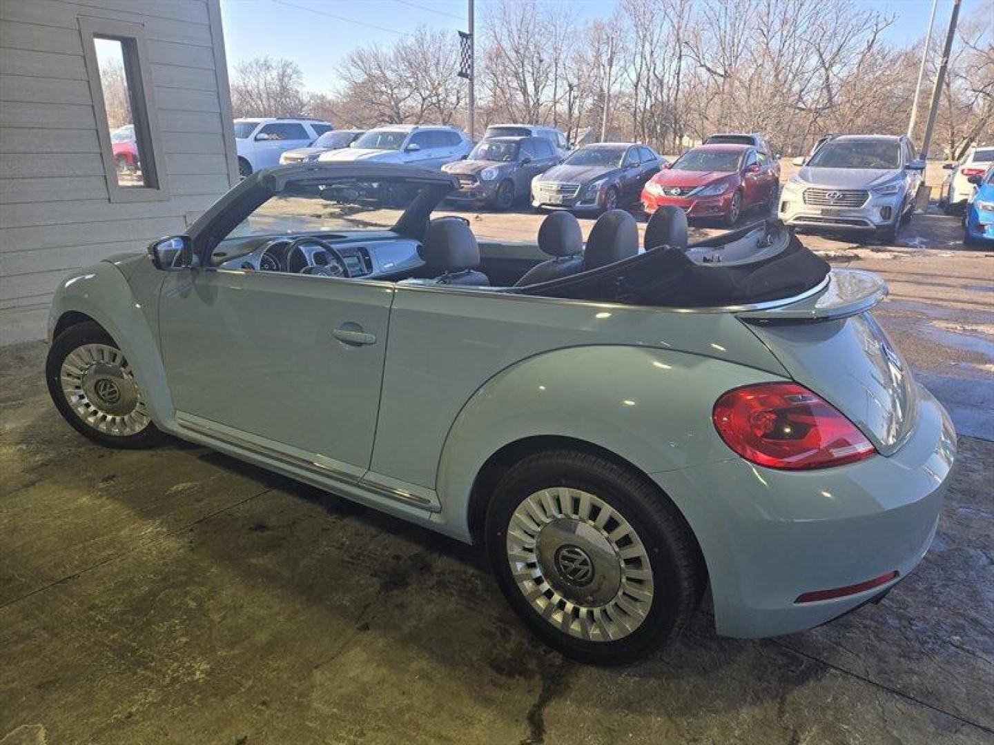 2015 Denim Blue Volkswagen Beetle Convertible 1.8T (3VW517AT5FM) with an 1.8L Turbo I4 170hp 184ft. lbs. PZEV engine, TipTronic transmission, located at 25355 Eames Street, Channahon, IL, 60410, (815) 467-1807, 41.429108, -88.228432 - Looking for a thrilling ride that combines style, performance, and efficiency? Look no further than the 2015 Volkswagen Beetle Convertible 1.8T PZEV! This powerhouse is equipped with a 1.8L Turbo I4 engine that delivers a jaw-dropping 170 horsepower and 184 foot-pounds of torque, giving you the powe - Photo#6