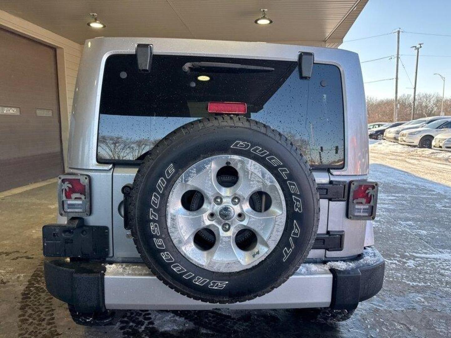 2014 Billet Silver Metallic Clear Coat Jeep Wrangler Unlimited Sahara (1C4BJWEG2EL) with an 3.6L V6 285hp 260ft. lbs. engine, located at 25355 Eames Street, Channahon, IL, 60410, (815) 467-1807, 41.429108, -88.228432 - Introducing the 2014 Jeep Wrangler Unlimited Sahara! This rugged and powerful SUV is ready for any adventure you can throw at it. Powered by a 3.6L V6 engine that produces 285 horsepower and 260 foot-pounds of torque, this Wrangler is built to handle any challenge. The exterior of this Wrangler is - Photo#3