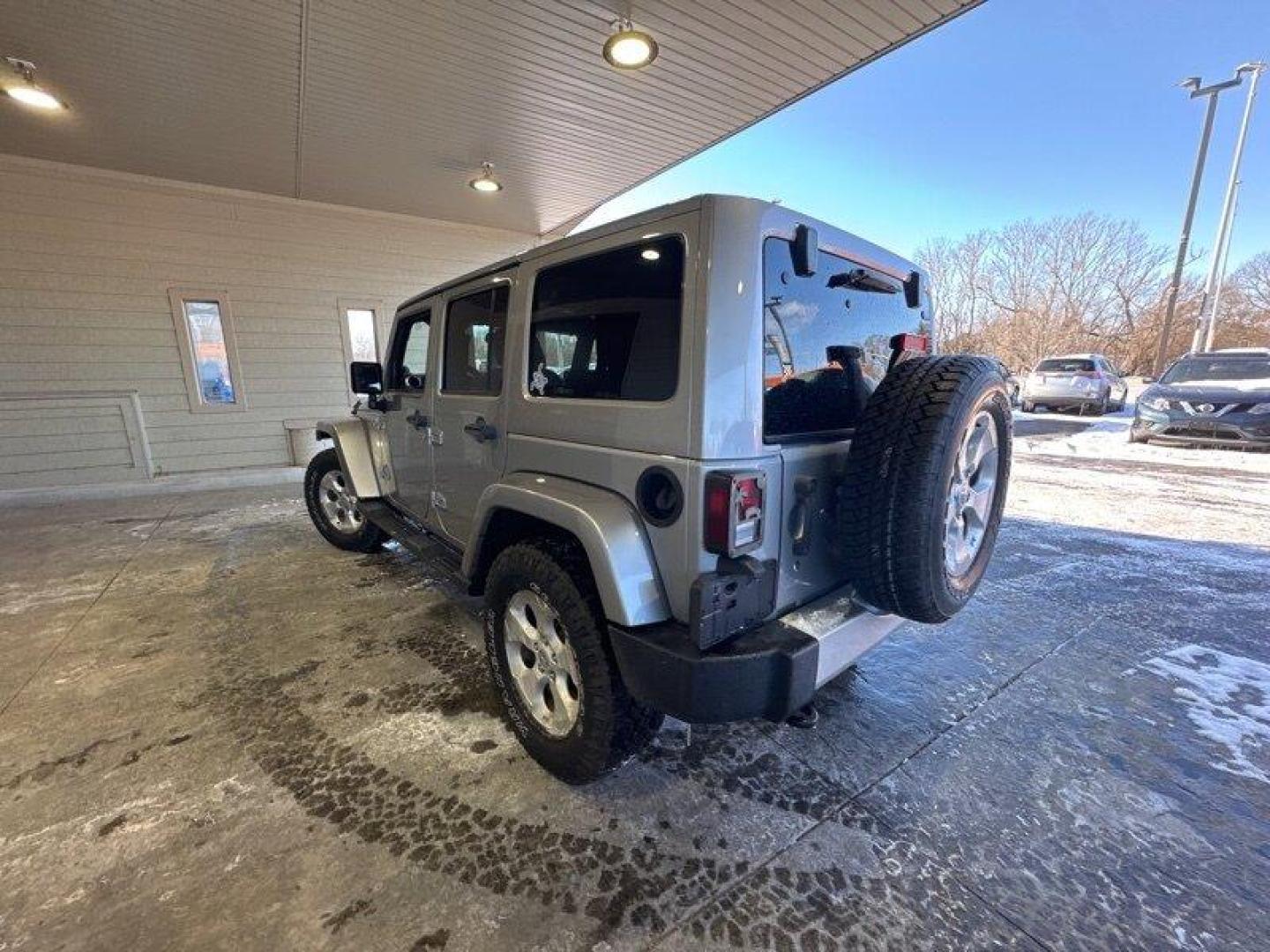 2014 Billet Silver Metallic Clear Coat Jeep Wrangler Unlimited Sahara (1C4BJWEG2EL) with an 3.6L V6 285hp 260ft. lbs. engine, located at 25355 Eames Street, Channahon, IL, 60410, (815) 467-1807, 41.429108, -88.228432 - Introducing the 2014 Jeep Wrangler Unlimited Sahara! This rugged and powerful SUV is ready for any adventure you can throw at it. Powered by a 3.6L V6 engine that produces 285 horsepower and 260 foot-pounds of torque, this Wrangler is built to handle any challenge. The exterior of this Wrangler is - Photo#4