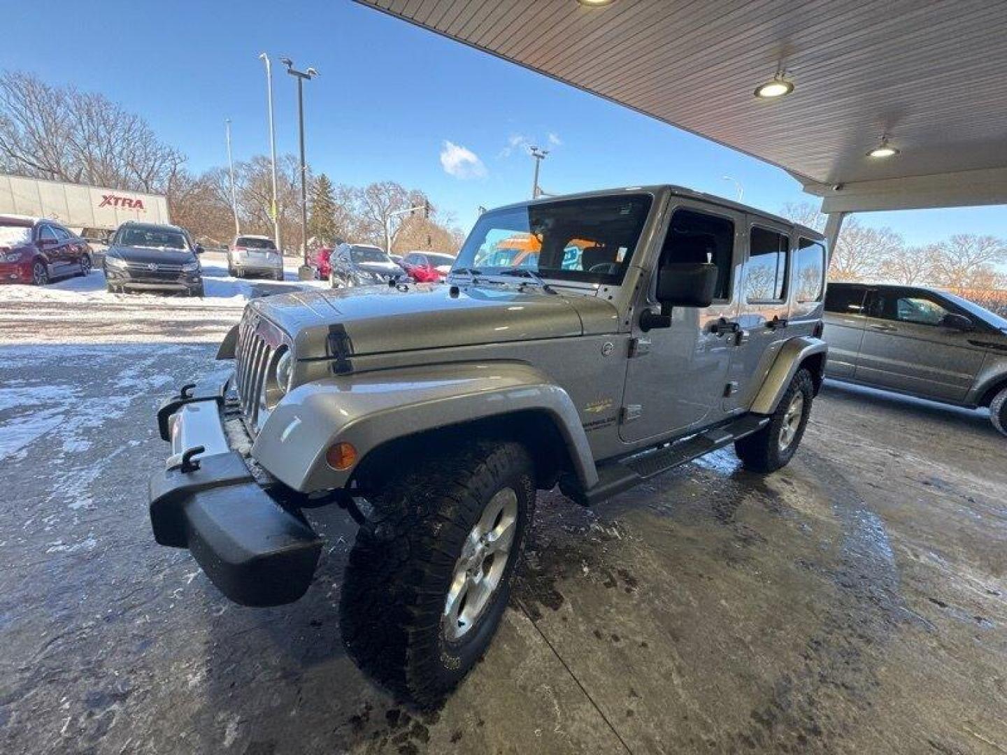 2014 Billet Silver Metallic Clear Coat Jeep Wrangler Unlimited Sahara (1C4BJWEG2EL) with an 3.6L V6 285hp 260ft. lbs. engine, located at 25355 Eames Street, Channahon, IL, 60410, (815) 467-1807, 41.429108, -88.228432 - Introducing the 2014 Jeep Wrangler Unlimited Sahara! This rugged and powerful SUV is ready for any adventure you can throw at it. Powered by a 3.6L V6 engine that produces 285 horsepower and 260 foot-pounds of torque, this Wrangler is built to handle any challenge. The exterior of this Wrangler is - Photo#6