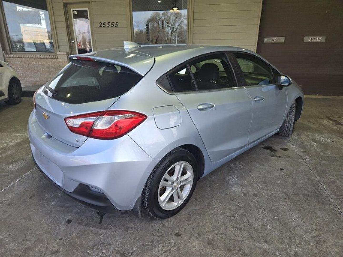 2017 Kinetic Blue Metallic Chevrolet Cruze LT (3G1BE6SM0HS) with an 1.4 engine, Automatic transmission, located at 25355 Eames Street, Channahon, IL, 60410, (815) 467-1807, 41.429108, -88.228432 - Introducing the 2017 Chevrolet Cruze LT Auto, a sleek and stylish sedan that exudes quality and performance. Powered by a 1.4 engine, this vehicle offers a smooth driving experience with excellent fuel efficiency, averaging 29 MPG in the city and 38 MPG on the highway. With a stunning Arctic Blue - Photo#3