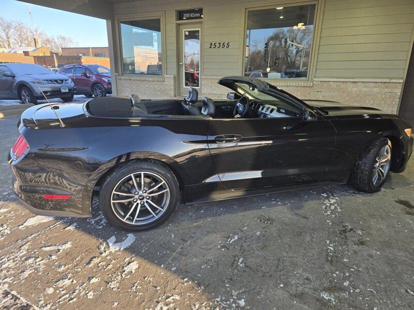 2015 Black Ford Mustang EcoBoost Premium (1FATP8UH1F5) with an EcoBoost 2.3L Turbo I4 310hp 320ft. lbs. engine, Automatic transmission, located at 25355 Eames Street, Channahon, IL, 60410, (815) 467-1807, 41.429108, -88.228432 - Introducing a stunning 2015 Ford Mustang EcoBoost Premium, featuring a powerful EcoBoost 2.3L Turbo I4 310hp 320ft. lbs. engine. This vehicle is a perfect blend of performance and style. The exterior of this Mustang is coated in a classic Black color, while the interior is clad in Raven Black, givin - Photo#4