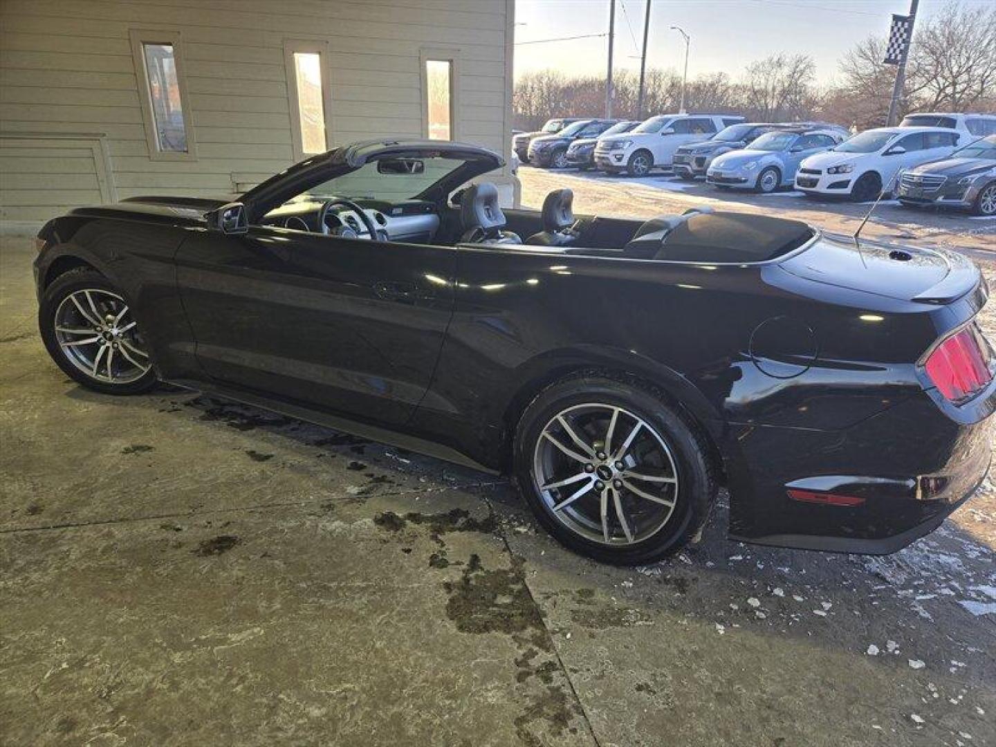 2015 Black Ford Mustang EcoBoost Premium (1FATP8UH1F5) with an EcoBoost 2.3L Turbo I4 310hp 320ft. lbs. engine, Automatic transmission, located at 25355 Eames Street, Channahon, IL, 60410, (815) 467-1807, 41.429108, -88.228432 - Introducing a stunning 2015 Ford Mustang EcoBoost Premium, featuring a powerful EcoBoost 2.3L Turbo I4 310hp 320ft. lbs. engine. This vehicle is a perfect blend of performance and style. The exterior of this Mustang is coated in a classic Black color, while the interior is clad in Raven Black, givin - Photo#7